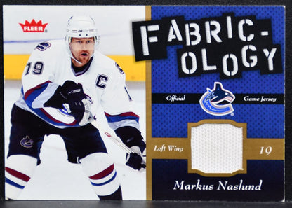 2006-07 Fleer Fabricology Markus Naslund F-MN Vancouver Canucks Jersey 7874