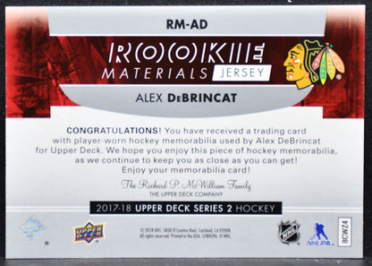 2017-18 UD Series 2 Rookie Materials Alex DeBrincat Blackhawks RC Jersey 4378