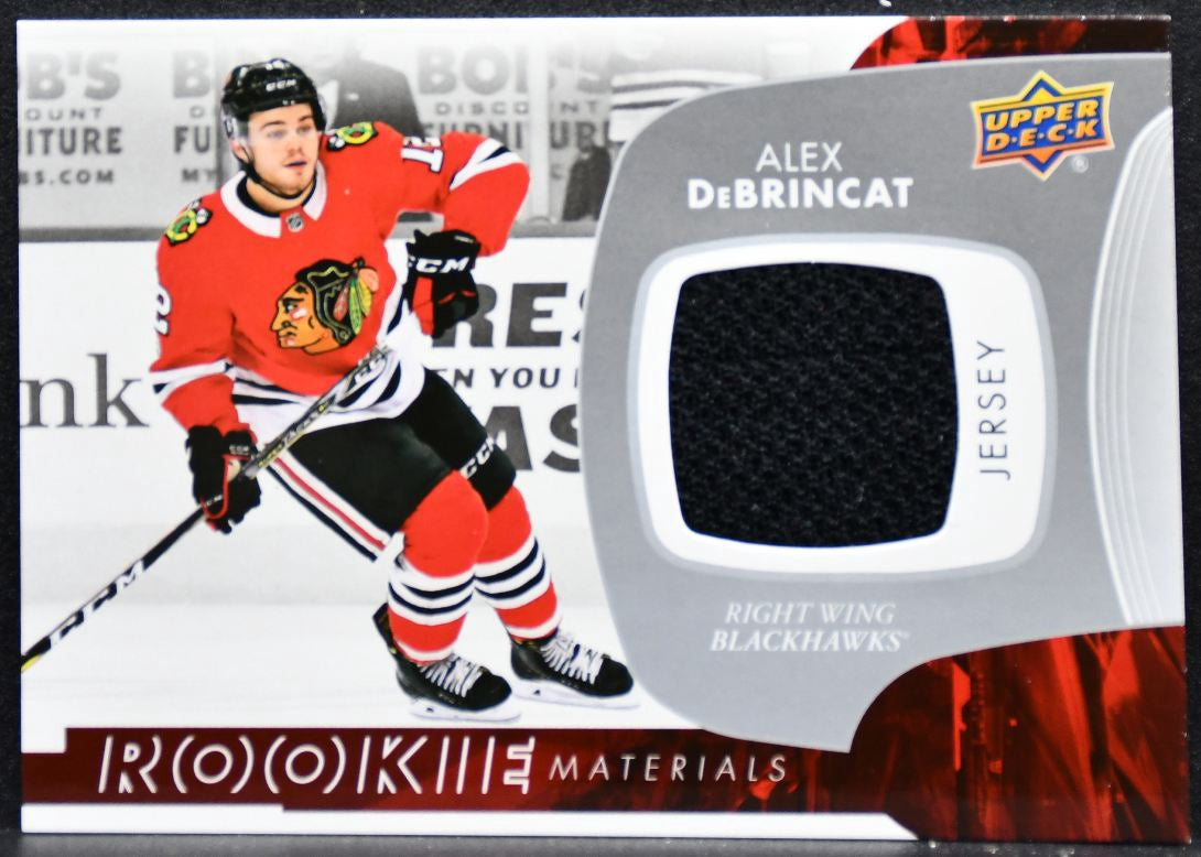 2017-18 UD Series 2 Rookie Materials Alex DeBrincat Blackhawks RC Jersey 4378