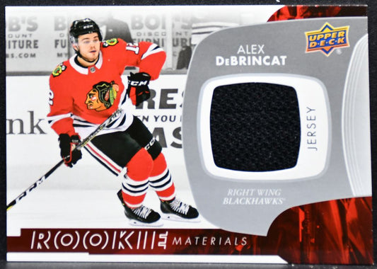 2017-18 UD Series 2 Rookie Materials Alex DeBrincat Blackhawks RC Jersey 4378