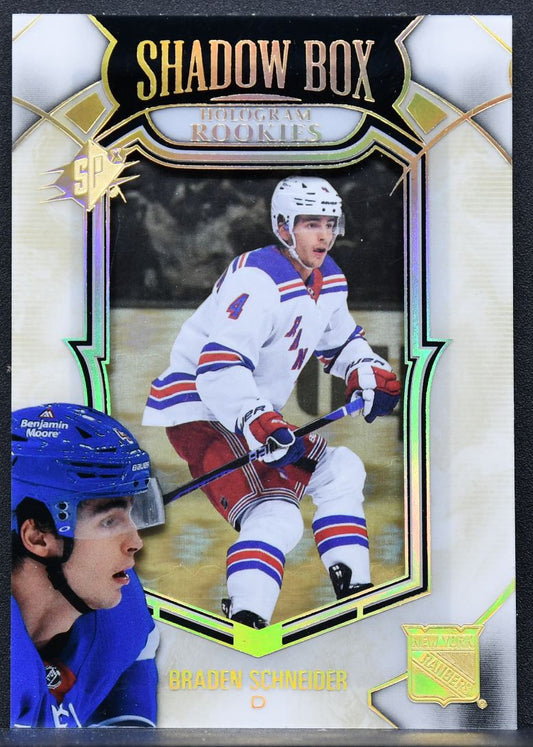 22-23 SPx Shadow Box Gold Spectrum Braden Schneider SB-46 Rangers RC 94/99 8792