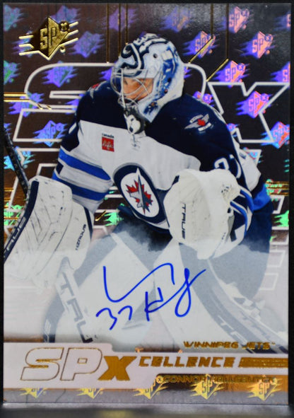 2024-25 SPx SPxCellence Auto Connor Hellebuyck XC-CH Winnipeg Jets Auto /99 8370