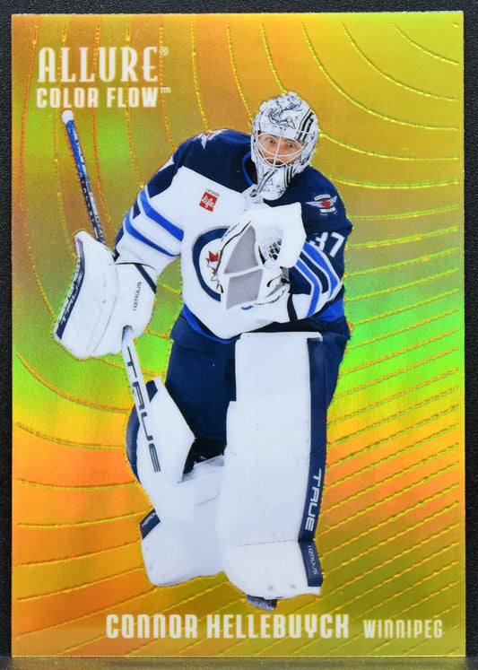 2025-26 Upper Deck Allure Color Flow Orange-Yellow Connor Hellebuyck Jets 3974