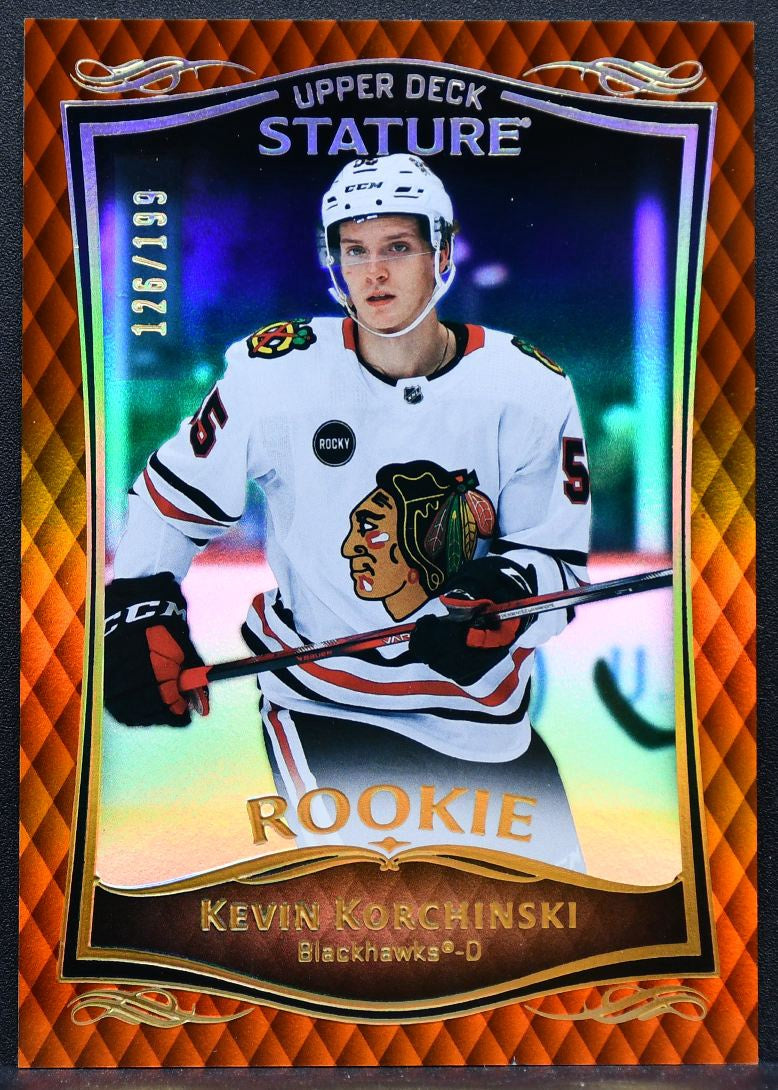 2023-24 UD Stature RC Orange Kevin Korchinski 46 Chicago Blackhawks RC 126/199 9257