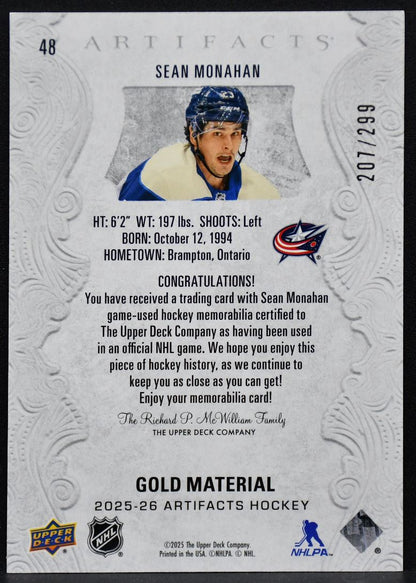 25-26 UD Artifacts Gold Material Sean Monahan Columbus Blue Jackets /299 Jersey 3972