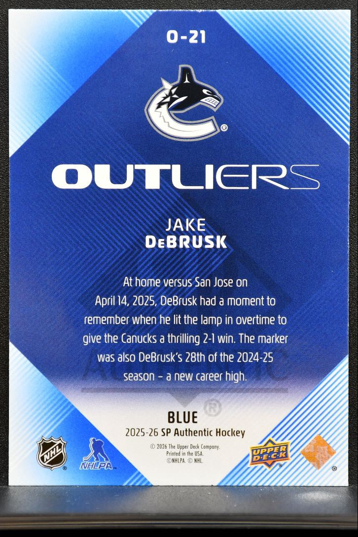 2025-26 SP Authentic Outliers Blue Jake DeBrusk O-21 Vancouver Canucks 1983