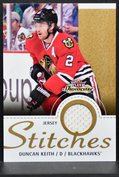 2013-14 Fleer Showcase Stitches Duncan Keith S-DK Chicago Blackhawks Jersey 4756