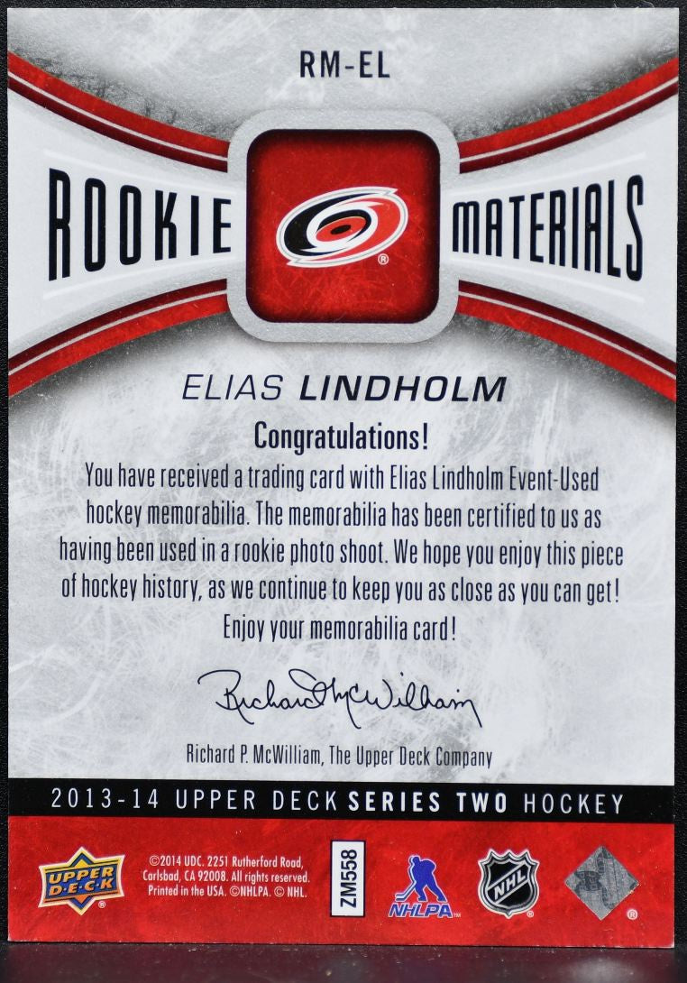 2013-14 UD Series 2 Rookie Materials Elias Lindholm Hurricanes RC Jersey 8693
