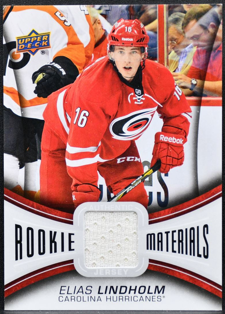 2013-14 UD Series 2 Rookie Materials Elias Lindholm Hurricanes RC Jersey 8693