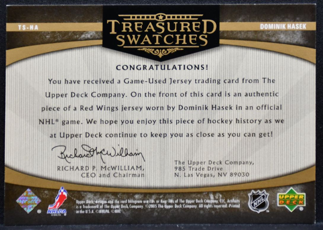 2005-06 UD Artifacts Treasured Swatches Hasek Senators Auto 097/275 Jersey 8574