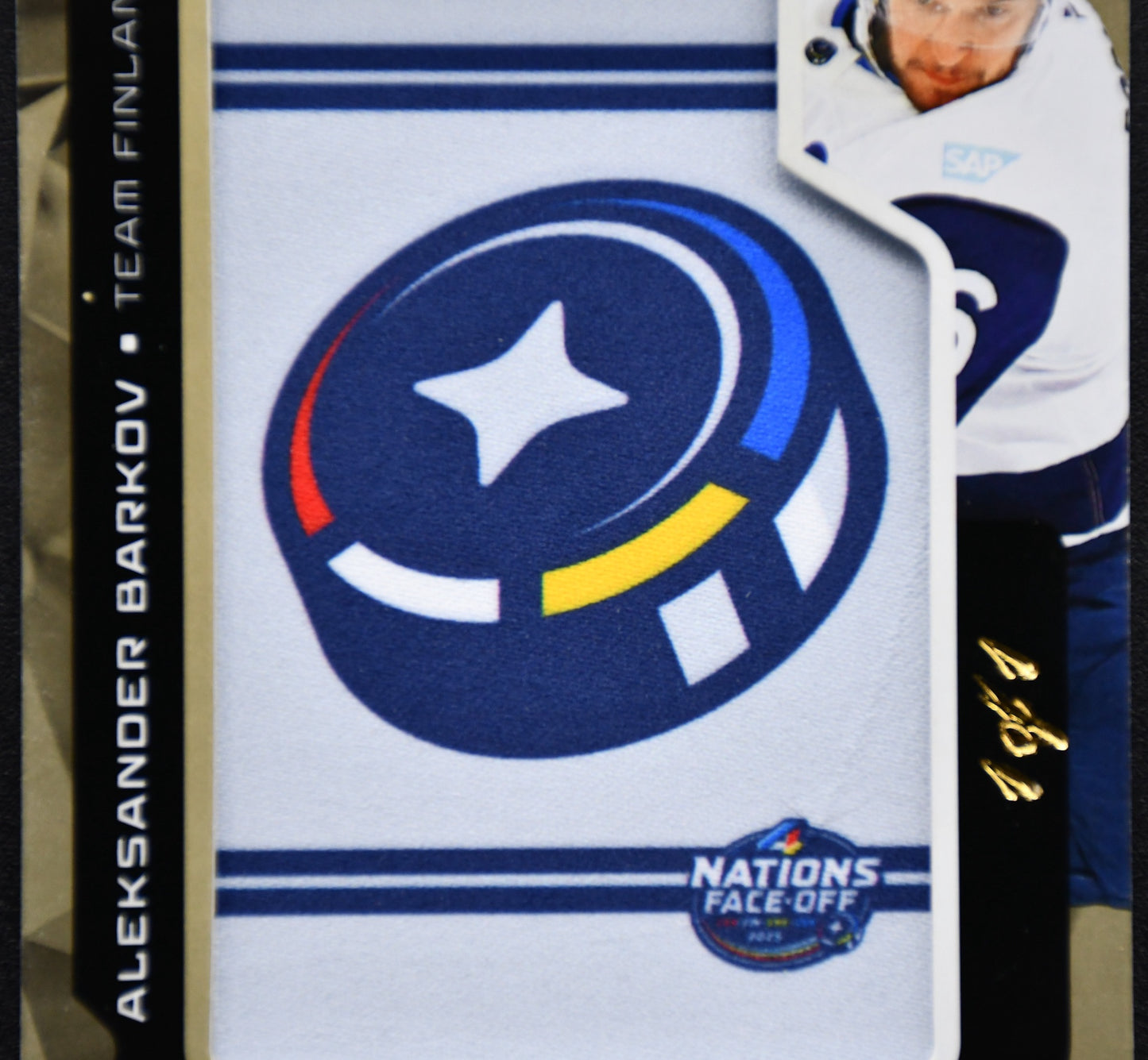 2025-26 UD Finland 4 Nations Face Off Team Logo Jumbos Aleksander Barkov 1/1