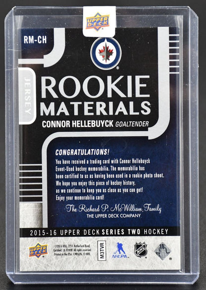 2015-16 UD Series 2 Rookie Materials Connor Hellebuyck RM-CH RC Jersey #1