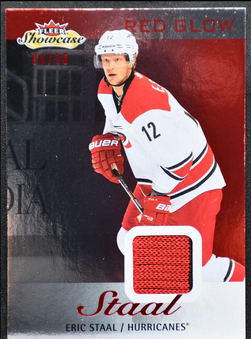2013-14 Fleer Showcase Jersey Red Glow Eric Staal Hurricanes 13302 Jersey 2782