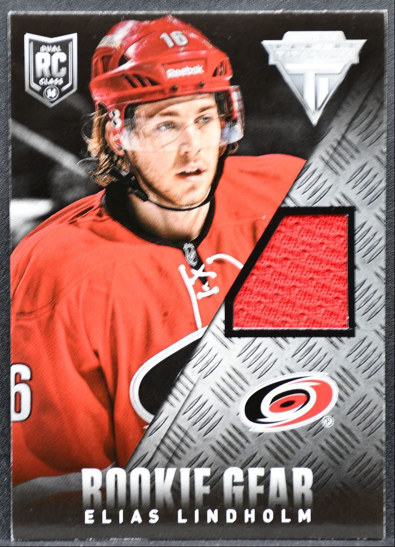 2013-14 Panini Titanium Rookie Gear Jersey Elias Lindholm RG-ELI RC Jersey 8403