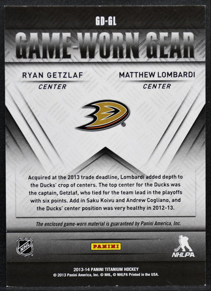 2013-14 Panini Titanium Game Worn Gear Dual Getzlaf/Lombardi /300 Jersey 9028