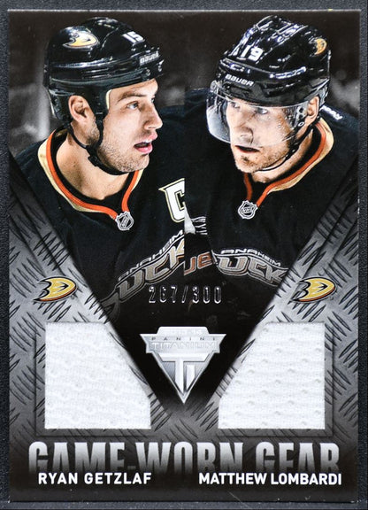 2013-14 Panini Titanium Game Worn Gear Dual Getzlaf/Lombardi /300 Jersey 9028