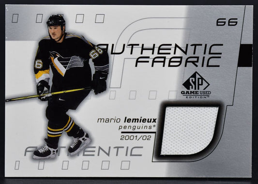 Maillot authentique porté en match par Mario Lemieux lors de la saison 2002-2003 (Authentic Fabrics).