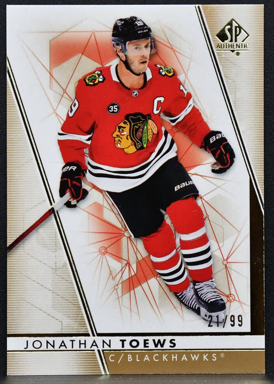 2022-23 SP Authentic Gold Limited Jonathan Toews 95 Chicago Blackhawks 21/99 7764