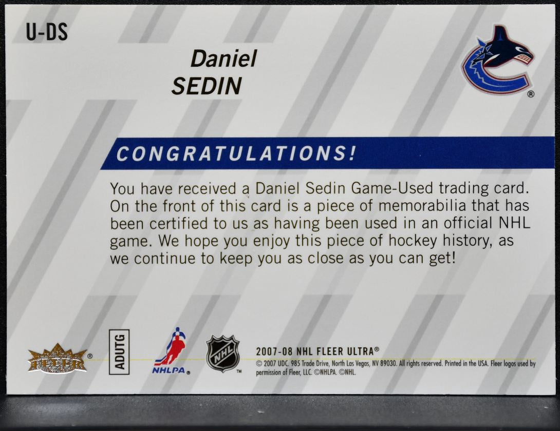 2007-08 Fleer Ultra Uniformity Jersey Daniel Sedin U-DS Jersey 5341
