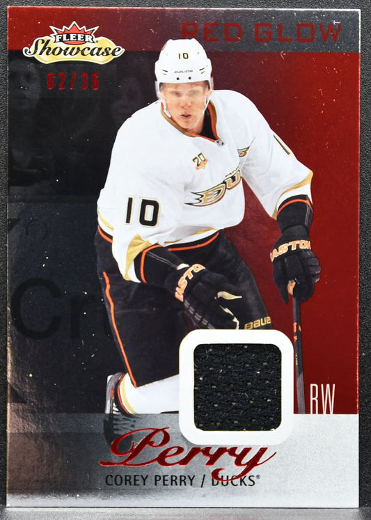 2013-14 Fleer Showcase Red Glow Corey Perry 4 Ducks Jersey 2624